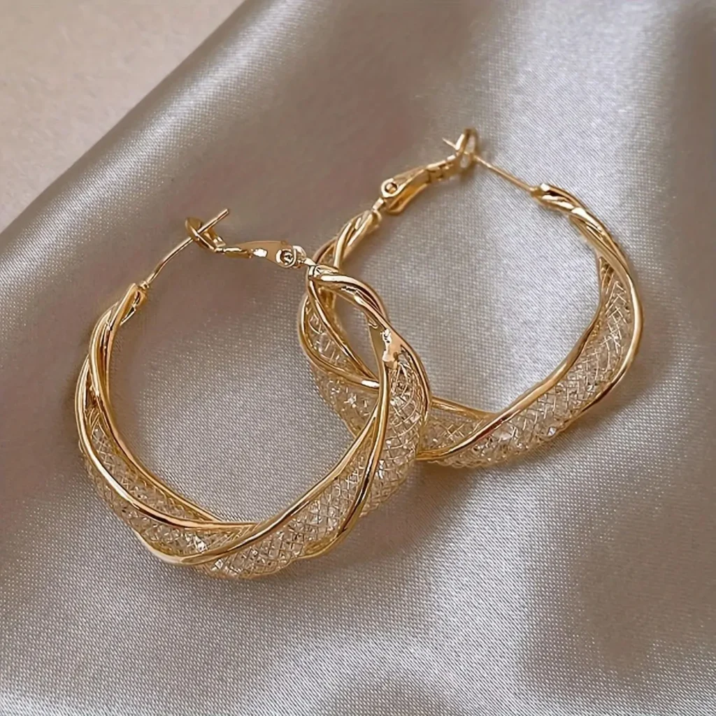 boucles-doreilles-en-or-et-pierres-transparentes