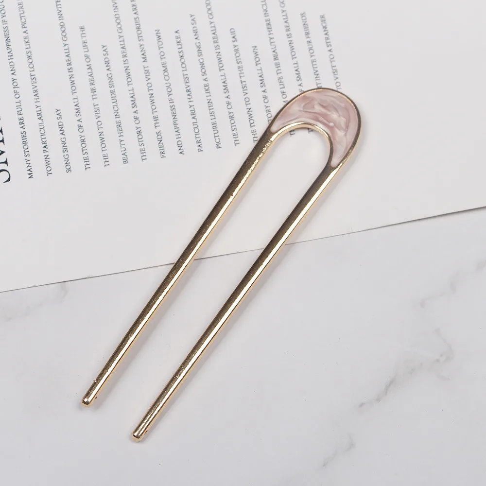 pince-a-cheveux-metal-dore